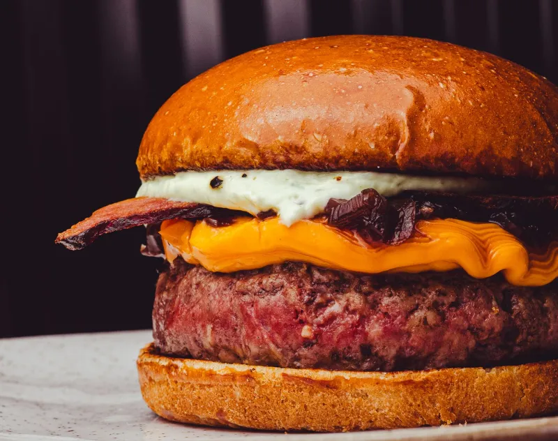 The $4 Avocado Is Watching: How Add-Ons Quietly Turn a $9 Burger Into a $18 Problem